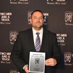 franchisee accepting safety award