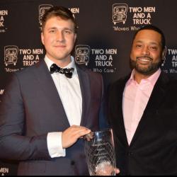 franchisees accepting humanitarian award