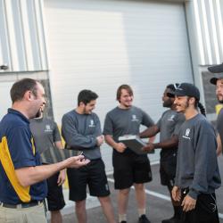 franchisee talking with the team