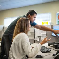 employees training on a computer